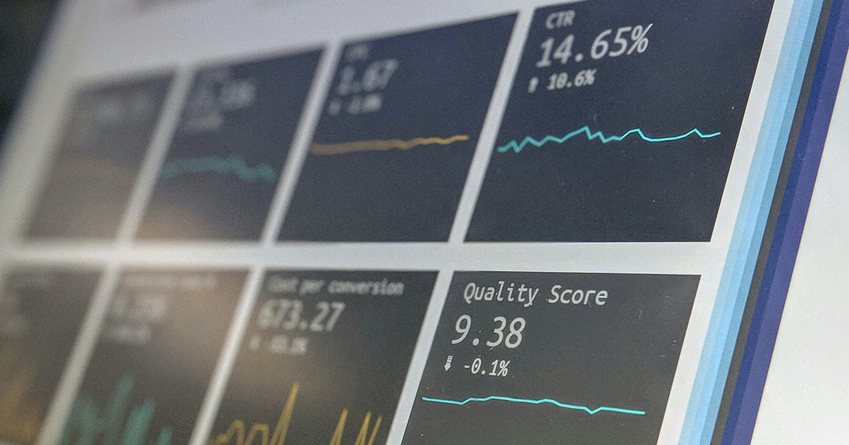 A close-up view of a monitor displaying various Amazon FBA Fees 2024 analytics and metrics.